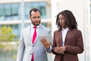 diverse business team watching content tablet1
